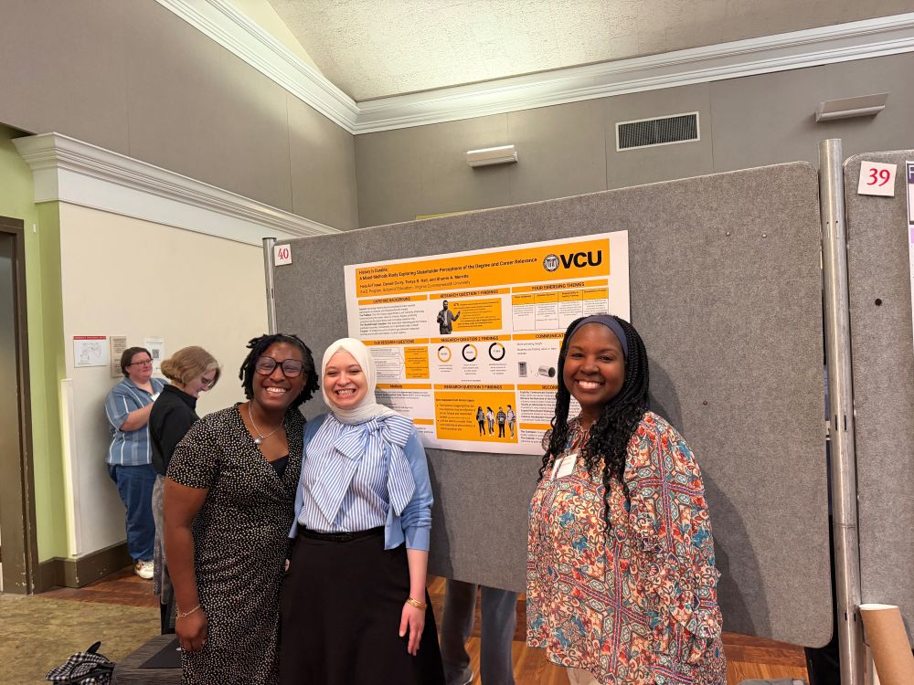 Three women presenting their research at the grad symposium 2026