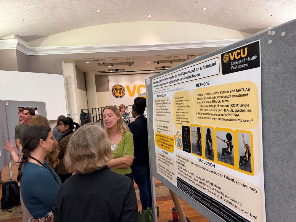 Woman talking about her CHP research at grad symposium 2026
